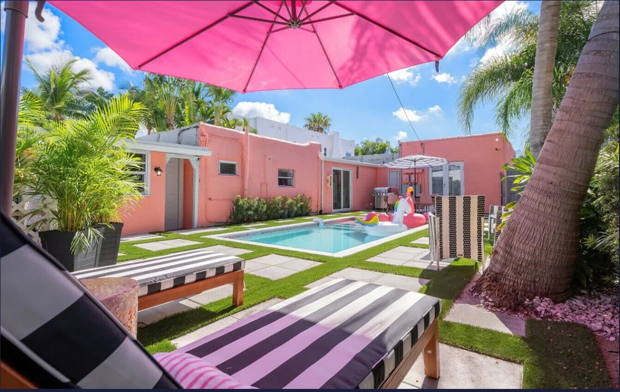 Barbie Beach Pad exterior with private heated pool and pink decor