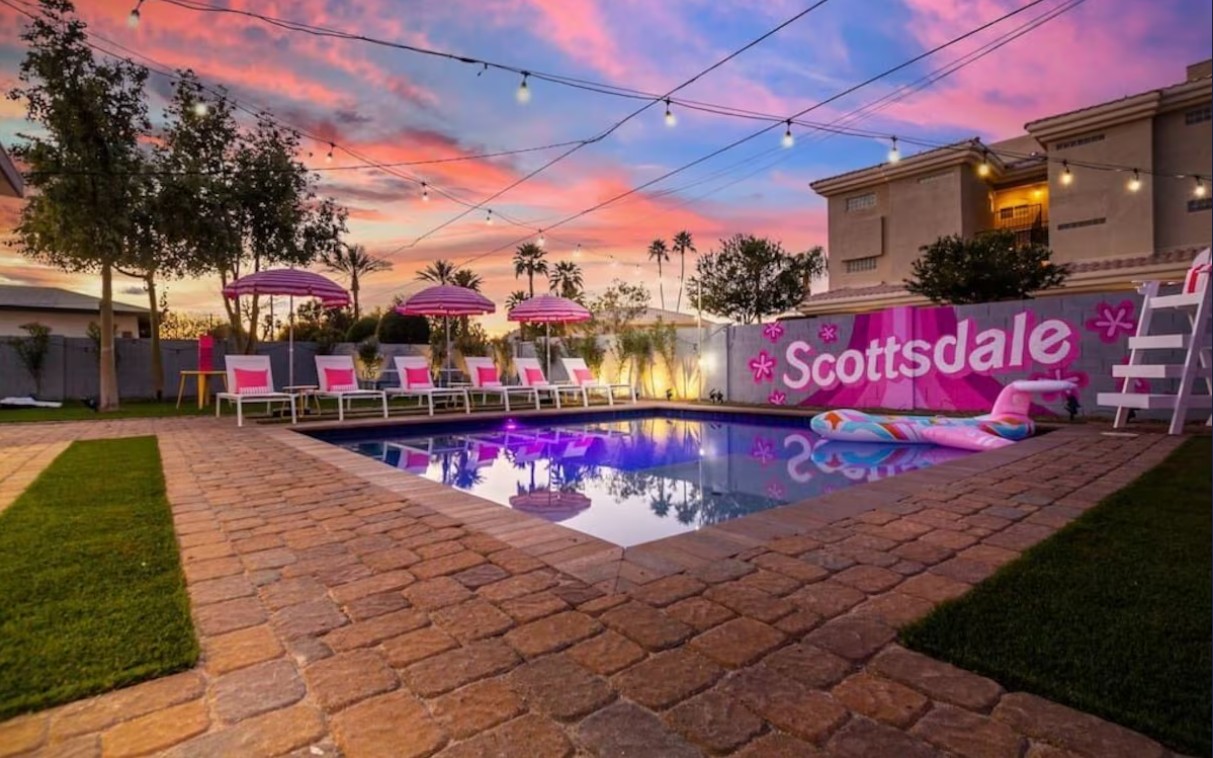 Scottsdoll Dreamhouse exterior with heated pool and lifeguard chair